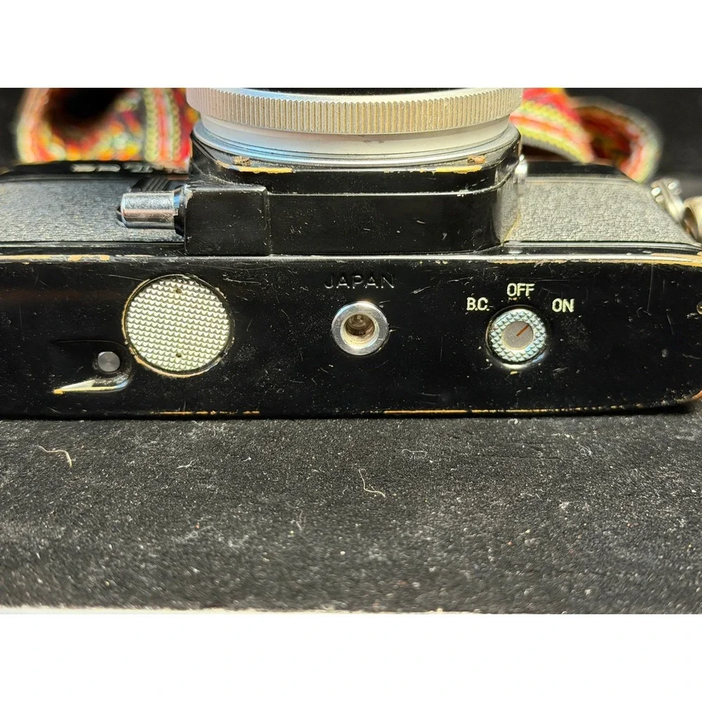 Minolta SRT 101 35mm Film Camera: with 55mm, 28mm, 200mm Lenses, Cases and Strap